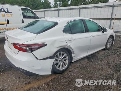 Trzecie zdjęcie samochodu z tyłu: 2021 TOYOTA CAMRY LE VIN:4T1C11AK7MU433048 - miniatura
