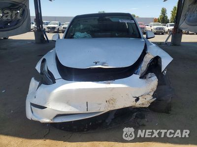 Piąte zdjęcie samochodu w środku: 2021 TESLA MODEL Y VIN:5YJYGDEE9MF150254 - miniatura