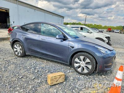 Czwarte zdjęcie samochodu z boku: 2022 TESLA MODEL Y VIN:7SAYGDEE8NF380422 - miniatura