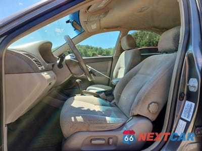 Zdjęcie 7 z 12 samochodu: 2003 TOYOTA CAMRY LE VIN:4T1BE32K03U733930 - miniatura