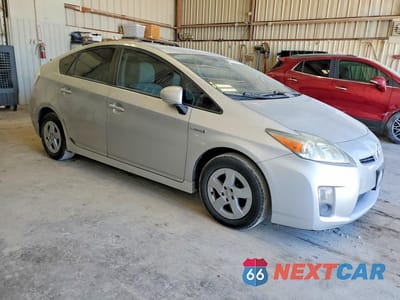 Czwarte zdjęcie samochodu z boku: 2011 TOYOTA PRIUS THREE VIN:JTDKN3DU9B1409930 - miniatura