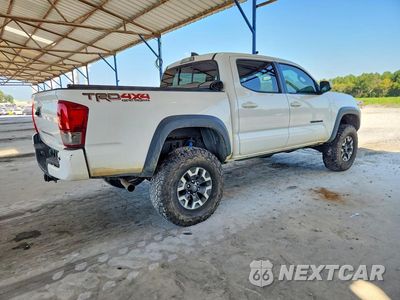 Trzecie zdjęcie samochodu z tyłu: 2016 TOYOTA TACOMA TRD OFF-ROAD VIN:5TFCZ5AN5GX033667 - miniatura