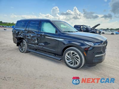 Czwarte zdjęcie samochodu z boku: 2026 LINCOLN NAVIGATOR RESERVE VIN:5LMJJ2LG4TEL13705 - miniatura