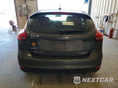Zdjęcie 6 z 12 samochodu: 2016 FORD FOCUS TITANIUM VIN:1FADP3N29GL274448 - miniatura