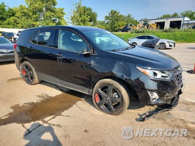 Czwarte zdjęcie samochodu z boku: 2019 CHEVROLET EQUINOX LT VIN:2GNAXLEX4K6210576 - miniatura