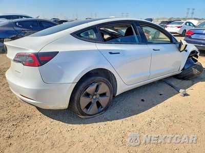Trzecie zdjęcie samochodu z tyłu: 2023 TESLA MODEL 3 VIN:5YJ3E1EB0PF611088 - miniatura