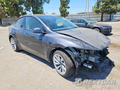Czwarte zdjęcie samochodu z boku: 2026 TESLA MODEL Y VIN:7SAYGDEE7TF375497 - miniatura