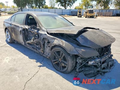 Czwarte zdjęcie samochodu z boku: 2013 BMW 750 LI VIN:WBAYE8C5XDD132205 - miniatura