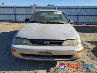 Piąte zdjęcie samochodu w środku: 1995 TOYOTA COROLLA DX VIN:1NXAE09B2SZ351882 - miniatura
