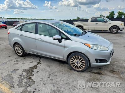 Czwarte zdjęcie samochodu z boku: 2014 FORD FIESTA TITANIUM VIN:3FADP4CJ8EM241713 - miniatura