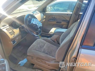 Zdjęcie 7 z 14 samochodu: 2004 HONDA PILOT EX VIN:2HKYF18454H614677 - miniatura