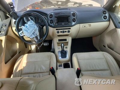 Zdjęcie 8 z 14 samochodu: 2014 VOLKSWAGEN TIGUAN S VIN:WVGBV3AX8EW031584 - miniatura