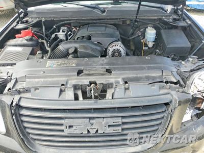 Zdjęcie 12 z 13 samochodu: 2010 GMC YUKON SLE VIN:1GKMCAE34AR173944 - miniatura