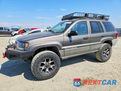 1999 JEEP GRAND CHEROKEE LAREDO 1J4GW58S5XC687799 - główne zdjęcie licytacji z USA - miniatura