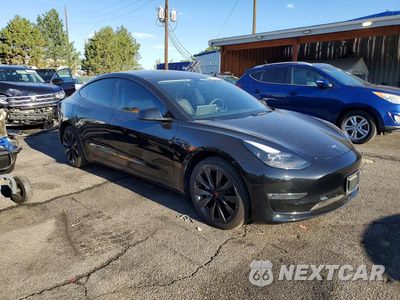 Czwarte zdjęcie samochodu z boku: 2023 TESLA MODEL 3 VIN:5YJ3E1EB1PF628871 - miniatura