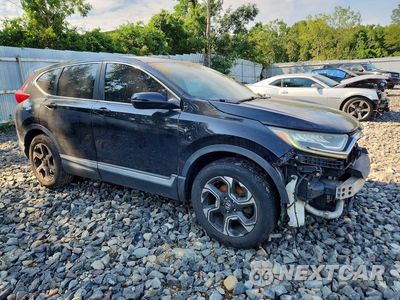 Czwarte zdjęcie samochodu z boku: 2017 HONDA CR-V TOURING VIN:2HKRW2H91HH679778 - miniatura
