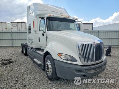 Czwarte zdjęcie samochodu z boku: 2016 INTERNATIONAL LF687 SEMI TRUCK VIN:3HSDJSNR6GN074260 - miniatura
