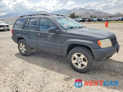 Czwarte zdjęcie samochodu z boku: 1999 JEEP GRAND CHEROKEE LIMITED VIN:1J4G268S7XC537159 - miniatura
