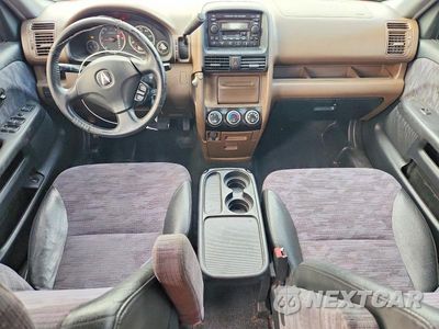 Zdjęcie 8 z 12 samochodu: 2004 HONDA CR-V LX VIN:JHLRD68404C007799 - miniatura
