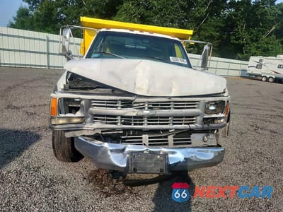 Piąte zdjęcie samochodu w środku: 1999 GMC SIERRA DUMP TRUCK VIN:1GDKC34FXXF039004 - miniatura