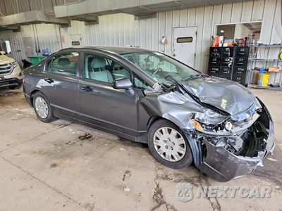 Czwarte zdjęcie samochodu z boku: 2010 HONDA CIVIC VP VIN:19XFA1F35AE082539 - miniatura