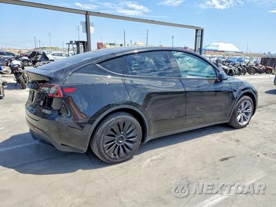 Trzecie zdjęcie samochodu z tyłu: 2023 TESLA MODEL Y VIN:7SAYGDEE0PF882439 - miniatura