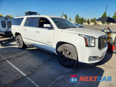 Czwarte zdjęcie samochodu z boku: 2017 GMC YUKON XL DENALI VIN:1GKS2HKJ2HR345176 - miniatura
