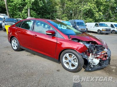 Czwarte zdjęcie samochodu z boku: 2013 FORD FOCUS SE VIN:1FADP3F23DL128816 - miniatura