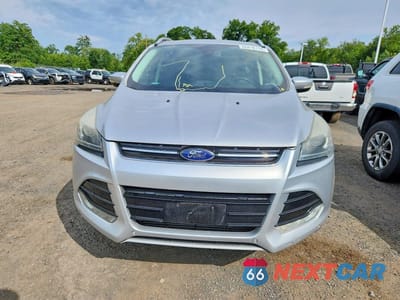 Piąte zdjęcie samochodu w środku: 2016 FORD ESCAPE TITANIUM VIN:1FMCU9J98GUB90633 - miniatura
