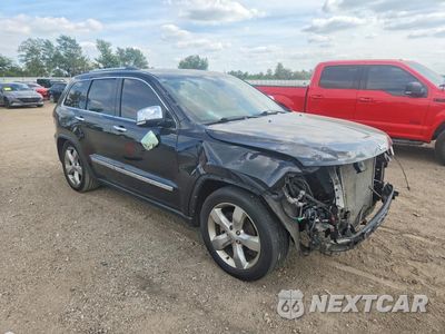 Czwarte zdjęcie samochodu z boku: 2013 JEEP GRAND CHEROKEE OVERLAND VIN:1C4RJFCG2DC646029 - miniatura