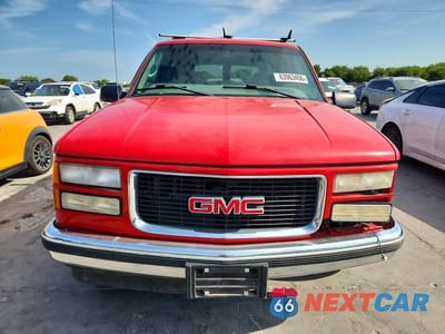 Piąte zdjęcie samochodu w środku: 1999 GMC YUKON VIN:1GKEC13R8XJ732463 - miniatura