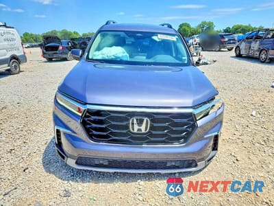Piąte zdjęcie samochodu w środku: 2024 HONDA PILOT TOURING VIN:5FNYG1H79RB003211 - miniatura