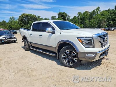 Czwarte zdjęcie samochodu z boku: 2021 NISSAN TITAN PLATINUM RESERVE VIN:1N6AA1ED7MN519281 - miniatura