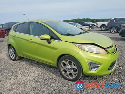 Czwarte zdjęcie samochodu z boku: 2012 FORD FIESTA SES VIN:3FADP4FJXCM137698 - miniatura