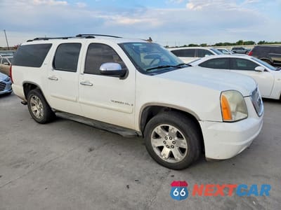 Czwarte zdjęcie samochodu z boku: 2007 GMC YUKON XL C1500 VIN:1GKFC16077J187096 - miniatura