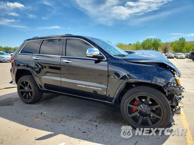 Czwarte zdjęcie samochodu z boku: 2015 JEEP GRAND CHEROKEE OVERLAND VIN:1C4RJFCG0FC854655 - miniatura