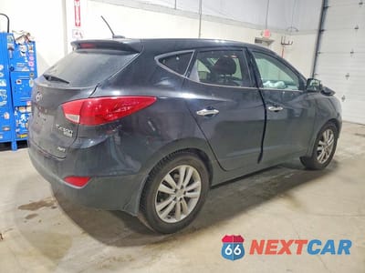 Trzecie zdjęcie samochodu z tyłu: 2010 HYUNDAI TUCSON LIMITED VIN:KM8JUCAC4AU085336 - miniatura