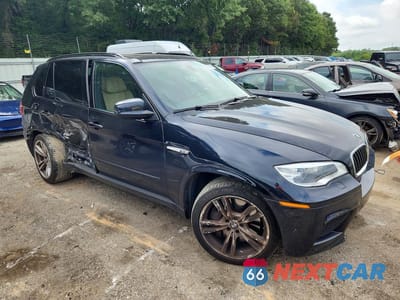 Czwarte zdjęcie samochodu z boku: 2013 BMW X5 M VIN:5YMGY0C58D0C11574 - miniatura