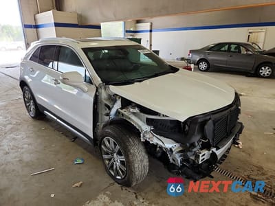 Czwarte zdjęcie samochodu z boku: 2023 CADILLAC XT4 PREMIUM LUXURY VIN:1GYFZDR42PF127413 - miniatura