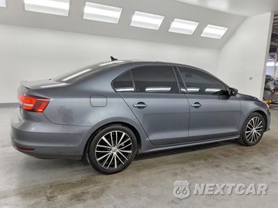 Trzecie zdjęcie samochodu z tyłu: 2016 VOLKSWAGEN JETTA SPORT VIN:3VWD17AJ7GM292703 - miniatura