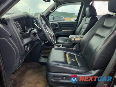 Zdjęcie 7 z 12 samochodu: 2014 HONDA RIDGELINE RTL-S VIN:5FPYK1F65EB009016 - miniatura