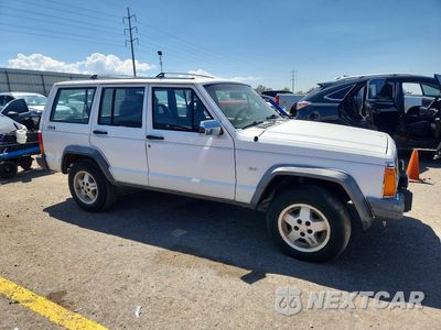 Czwarte zdjęcie samochodu z boku: 1990 JEEP CHEROKEE LAREDO VIN:1J4FJ58L4LL167588 - miniatura
