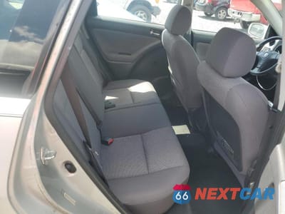 Zdjęcie 11 z 13 samochodu: 2004 TOYOTA MATRIX XR VIN:2T1KR32E94C176257 - miniatura