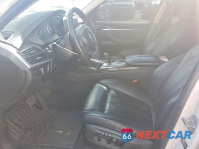 Zdjęcie 7 z 13 samochodu: 2014 BMW X5 XDRIVE50I VIN:5UXKR6C52E0C03747 - miniatura
