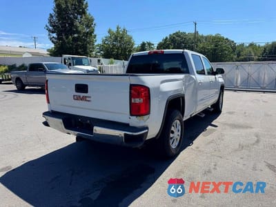Trzecie zdjęcie samochodu z tyłu: 2017 GMC SIERRA K1500 SLE VIN:3GTU2MEC5HG306947 - miniatura