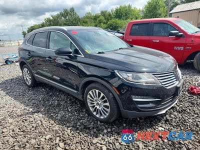 Czwarte zdjęcie samochodu z boku: 2017 LINCOLN MKC RESERVE VIN:5LMCJ3D99HUL49210 - miniatura