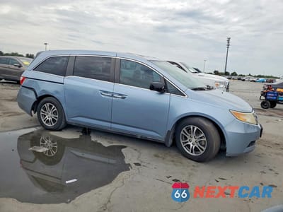 Czwarte zdjęcie samochodu z boku: 2012 HONDA ODYSSEY EXL VIN:5FNRL5H69CB095121 - miniatura