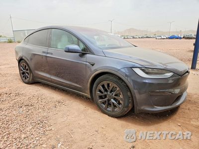 Czwarte zdjęcie samochodu z boku: 2022 TESLA MODEL X VIN:7SAXCAE52NF363279 - miniatura