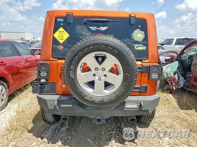 Zdjęcie 6 z 13 samochodu: 2011 JEEP WRANGLER UNLIMITED SAHARA VIN:1J4HA5H1XBL572490 - miniatura