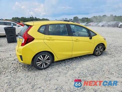 Trzecie zdjęcie samochodu z tyłu: 2016 HONDA FIT EX VIN:JHMGK5H73GX012411 - miniatura
